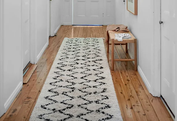 Carpet Runner in living room setting with measured placement beside furniture