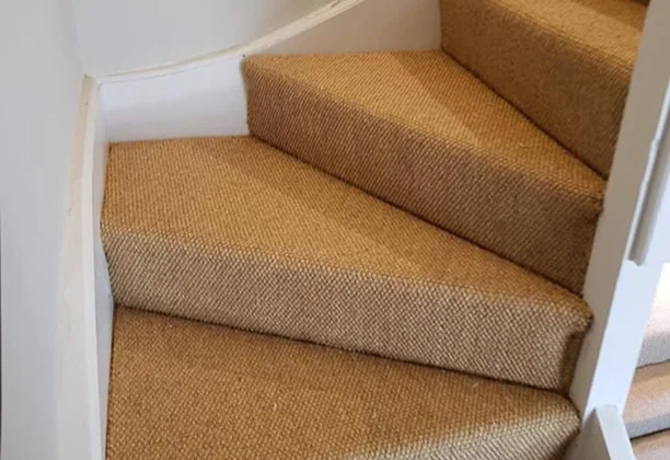 Coir Stair Carpet measured for stair treads during fitting process