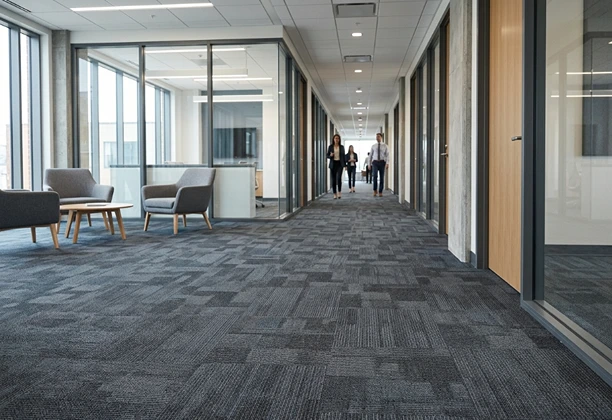 Commercial Carpet Flooring installed in office interiors with durable wall to wall coverage for high traffic areas.