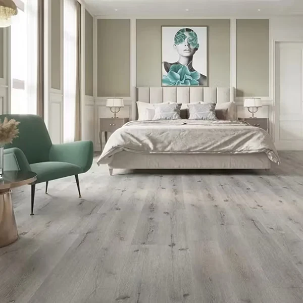 Elegant white marble-look SPC flooring featuring realistic stone details and a bright premium finish for contemporary interior spaces.