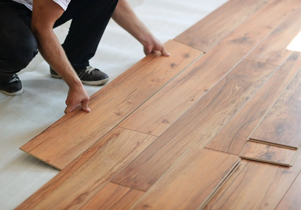 Flooring Installation Services In Dubai completing wood, vinyl, carpet, and tile installations