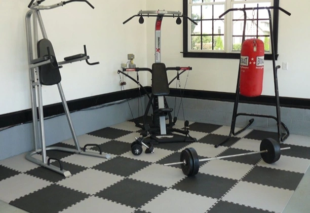 Foam Gym Flooring interlocking EVA foam tiles installed in a home workout area with secure edge alignment and cushioned surface