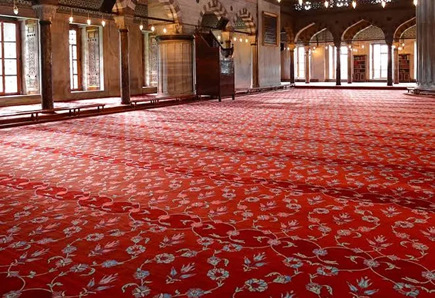 High-Quality Mosque Carpet installed across a spacious prayer hall with aligned prayer rows and durable woven surface for daily use