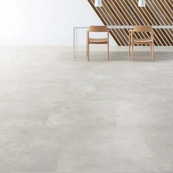 Industrial style interior featuring concrete-like SPC flooring with a minimalist design, realistic texture, and modern flooring appeal.