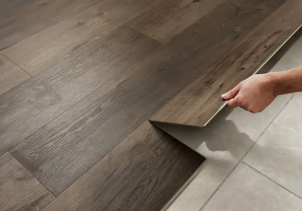 LVT Flooring featured in a modern apartment with continuous plank layout between rooms