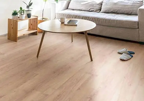 Laminate Flooring Dubai Installation featuring accurate cuts around walls, doors, and corners