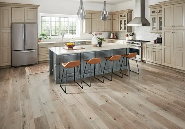 Laminate Flooring Dubai fitted in offices with clean transitions and organized floor pattern