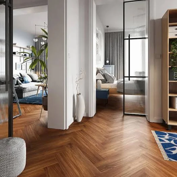 Modern herringbone-style SPC vinyl flooring offering durable performance, waterproof protection, and an attractive decorative pattern