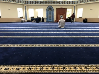 Mosque Carpet Dubai with decorative Islamic patterns installed in a large prayer area for organized worship rows