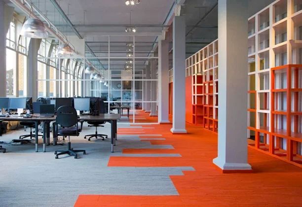Office Carpet Dubai with modular carpet tiles in modern workspace layout