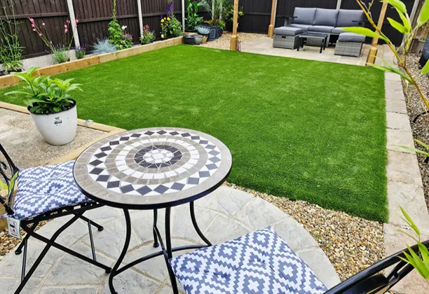 Our Artificial Grass Carpet In Dubai installed across a residential garden with even turf surface and clean edge finish