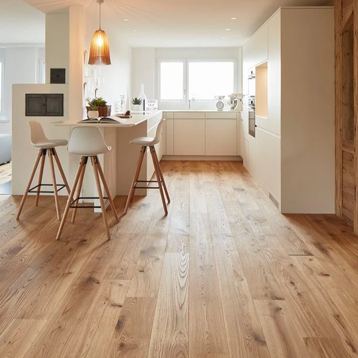 Parquet Wood Flooring fitted in a dining area with symmetrical hardwood block design
