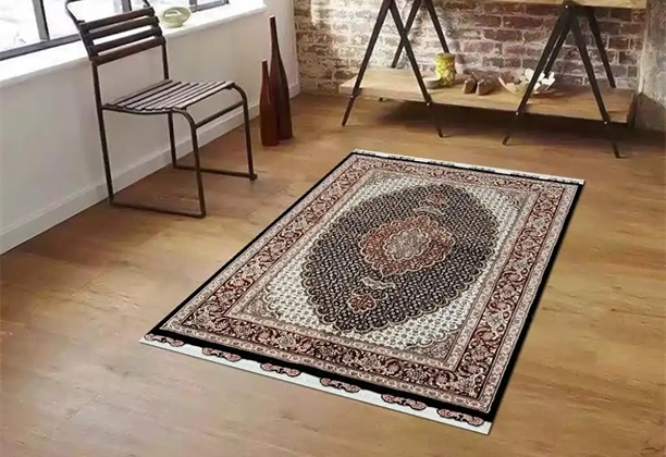 Persian Tabrez Rugs with detailed floral motifs and handwoven texture displayed in a traditional living room