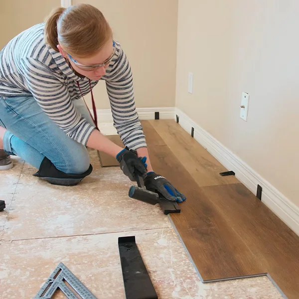 Re-install Baseboards LVT Flooring showing finished skirting fitted along room perimeter