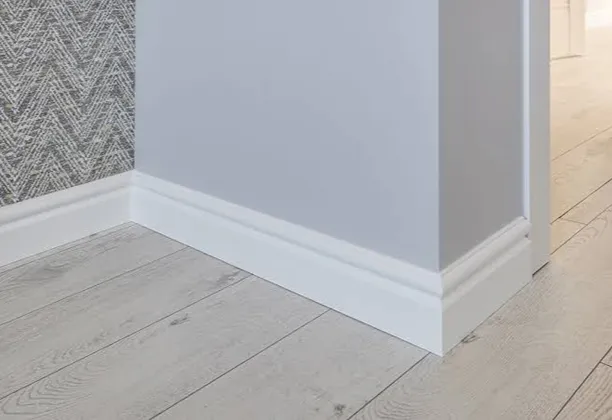 Wall Skirting installed along the base of a living room wall with a smooth finish and clean floor transition