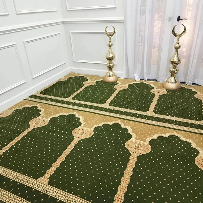 Wool Islamic mosque carpets installed in a spacious prayer hall with aligned rows and durable woven surface finish