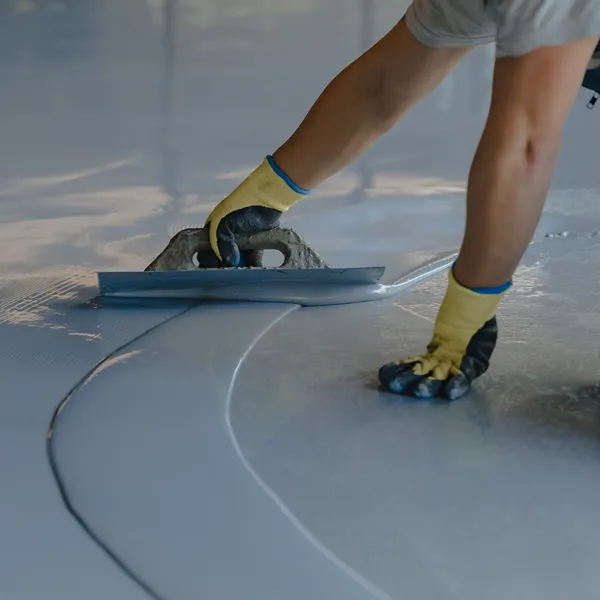 Priming and sealing concrete surfaces before epoxy floor application