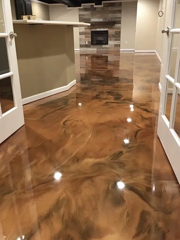 Glossy metallic epoxy floor with a decorative finish